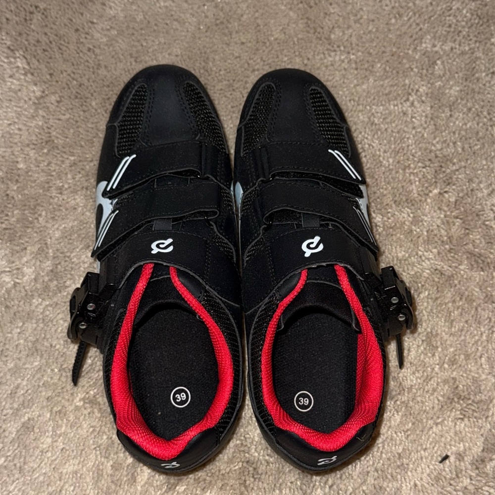 Black and White Peloton bike shoes